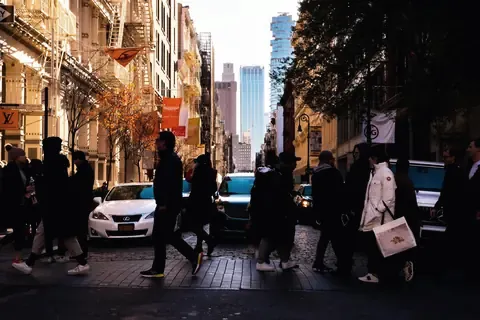 SoHo crosswalk and storefronts at street level in New York City